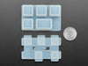 Top view of two Tab keycap molds separated.