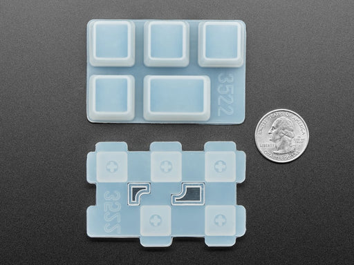 Top view of two Tab keycap molds separated.