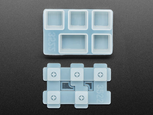 Top view of two Tab keycap molds separated.