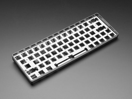 Angled shot of Silver Anodized Metal 60% / GH60 Keyboard Shell Plate.