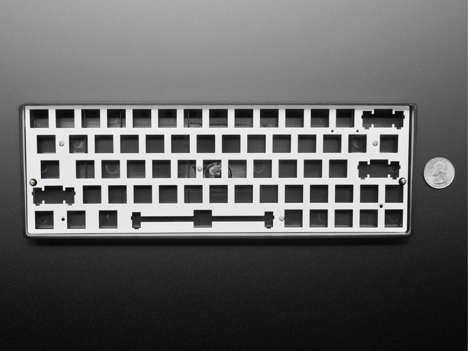 Angled shot of Silver Anodized Metal 60% / GH60 Keyboard Shell Plate.