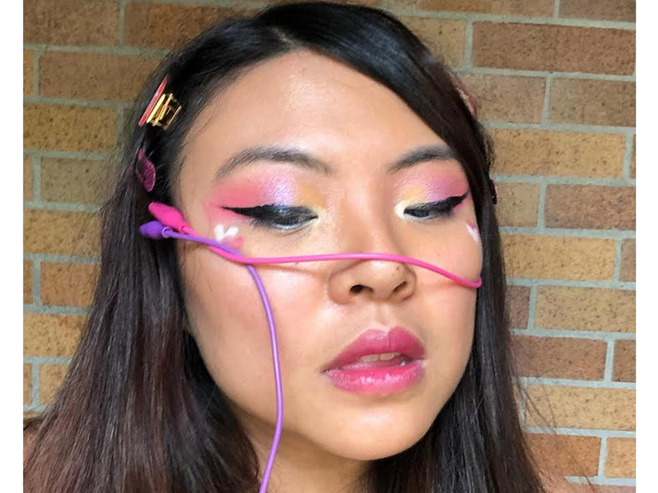 Angled shot of ten 13" long colorful alligator test clips.