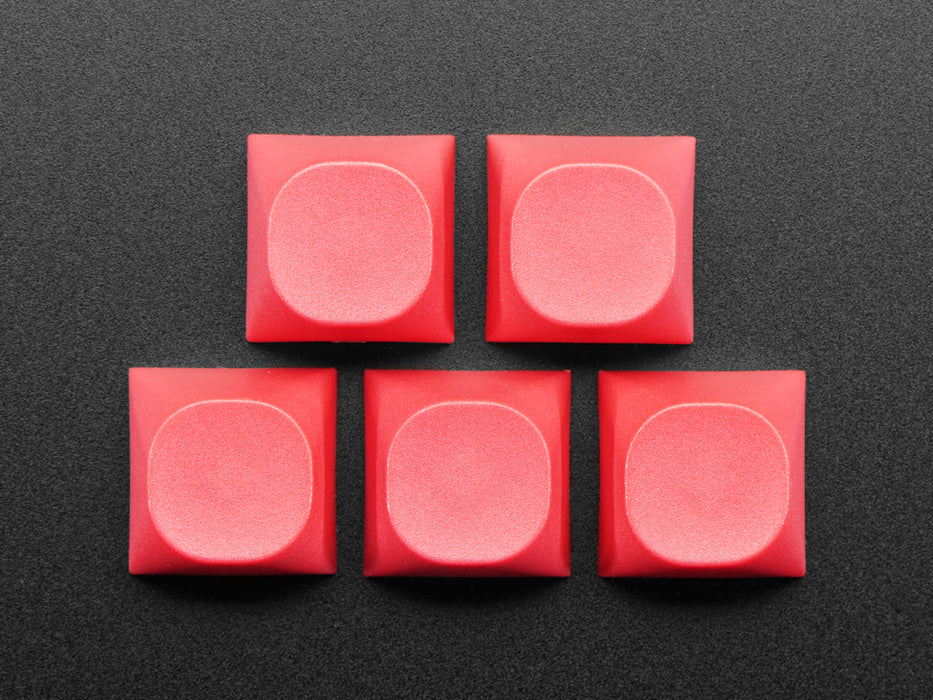 Angled shot of 5 keycaps.