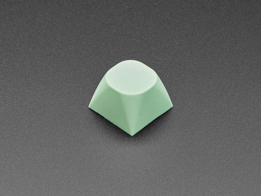 Angled shot of 10 mint screen MA keycaps.