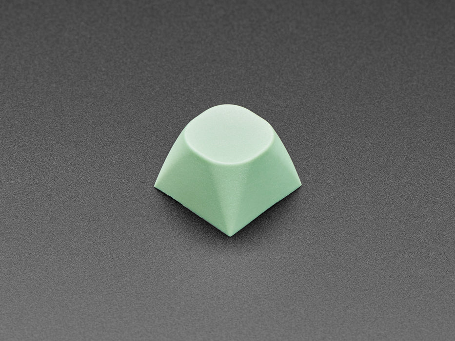 Angled shot of 10 mint screen MA keycaps.