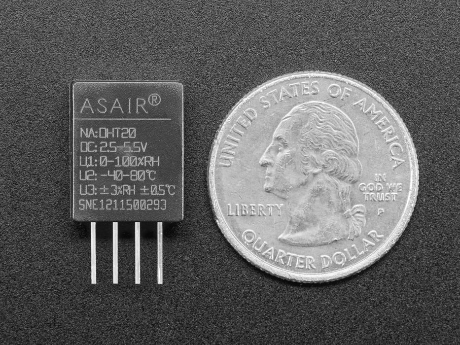 Top view of DHT20 sensor wired to a breadboard with an FeatherWing OLED display. The OLED shows the data from the temperature-humidity sensor.