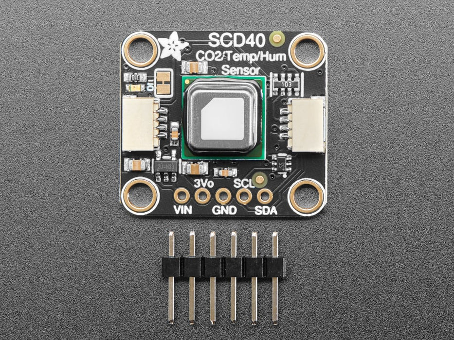 Angled shot of Adafruit SCD-40 - NDIR CO2 Temperature and Humidity Sensor.