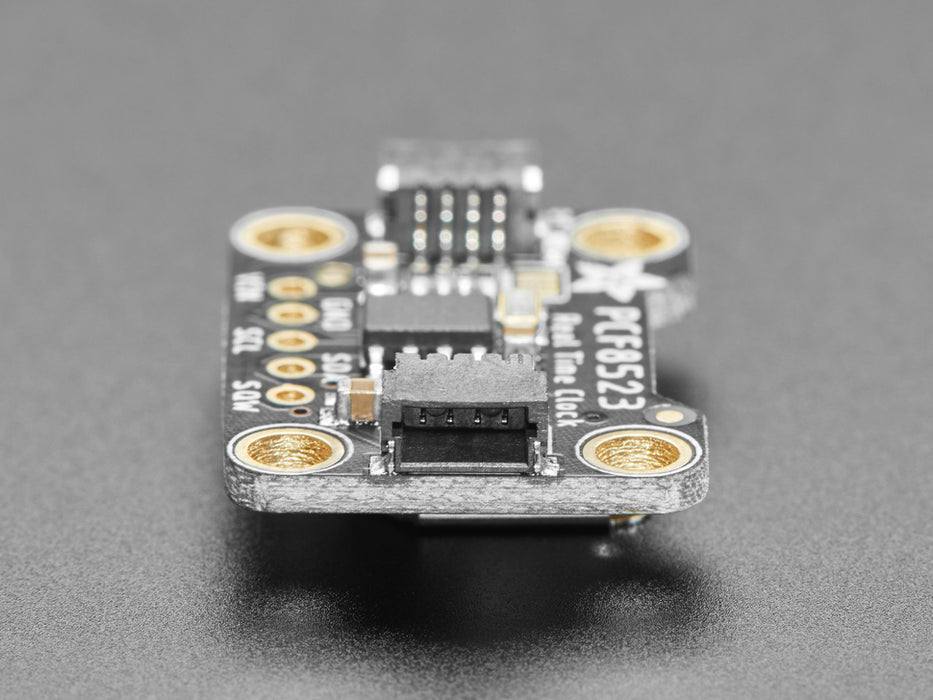 Angled shot of PCF8523 Real Time Clock Breakout Board.