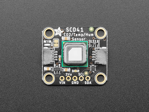 Angled shot of Adafruit SCD-41 - NDIR CO2 Temperature and Humidity Sensor.