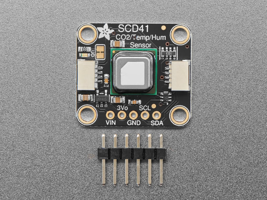 Angled shot of Adafruit SCD-41 - NDIR CO2 Temperature and Humidity Sensor.