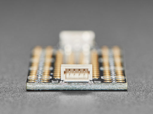 Angled shot of long, skinny prototyping breakout board.