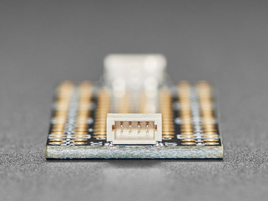 Angled shot of long, skinny prototyping breakout board.