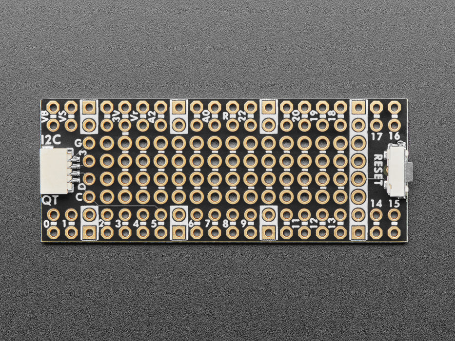 Angled shot of long, skinny prototyping breakout board.