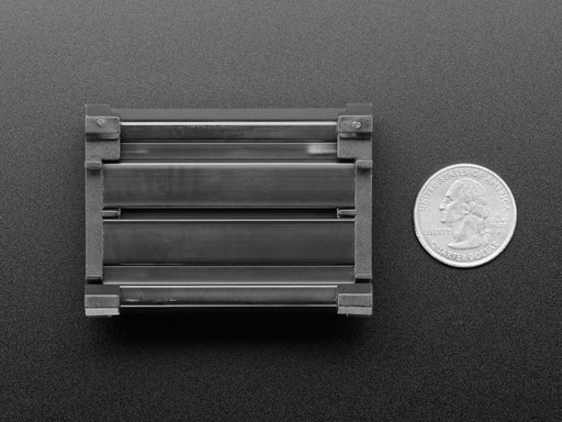 Angled shot of DIN Rail 10x10 to Terminal Block Adapter on a DIN rail.