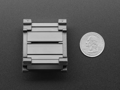 Angled shot of DIN Rail 6x6 to Terminal Block Adapter on a DIN rail.