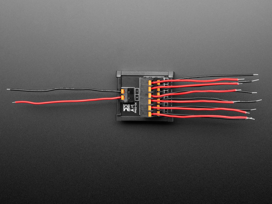 Angled shot of DIN Rail 6x6 to Terminal Block Adapter on a DIN rail.