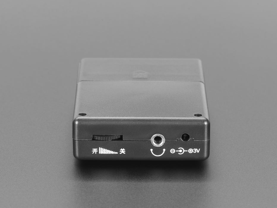 Angled shot of black speaker box with Chinese characters.