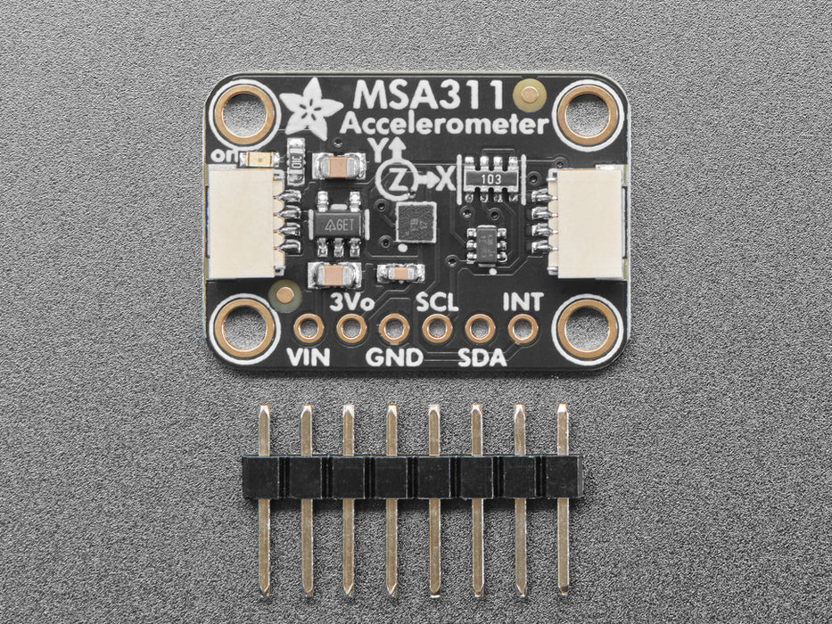 Angled shot of black accelerometer breakout board.