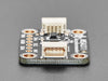 Angled shot of black accelerometer breakout board.