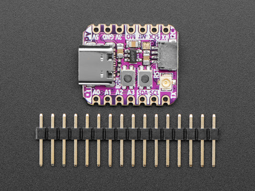 Angled shot of purple square-shaped microcontroller with a uFL antenna attached.