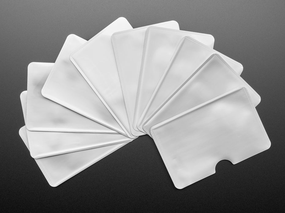 Angeld shot of ten fanned out silver RFID blocking card sleeves.