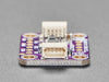 Angled shot of purple rectangular breakout board.