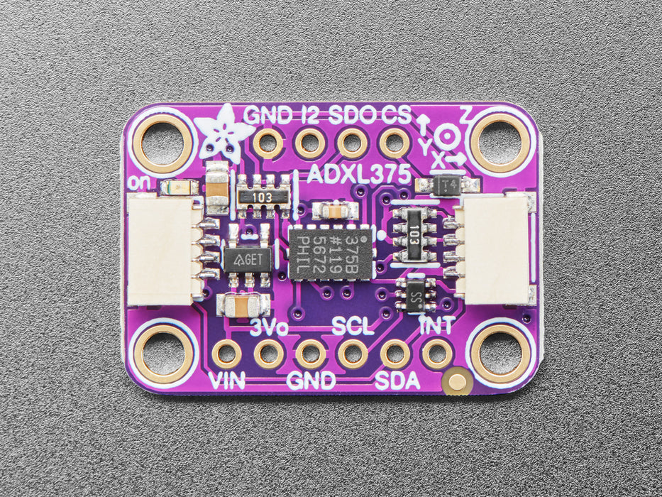 Angled shot of purple rectangular breakout board.