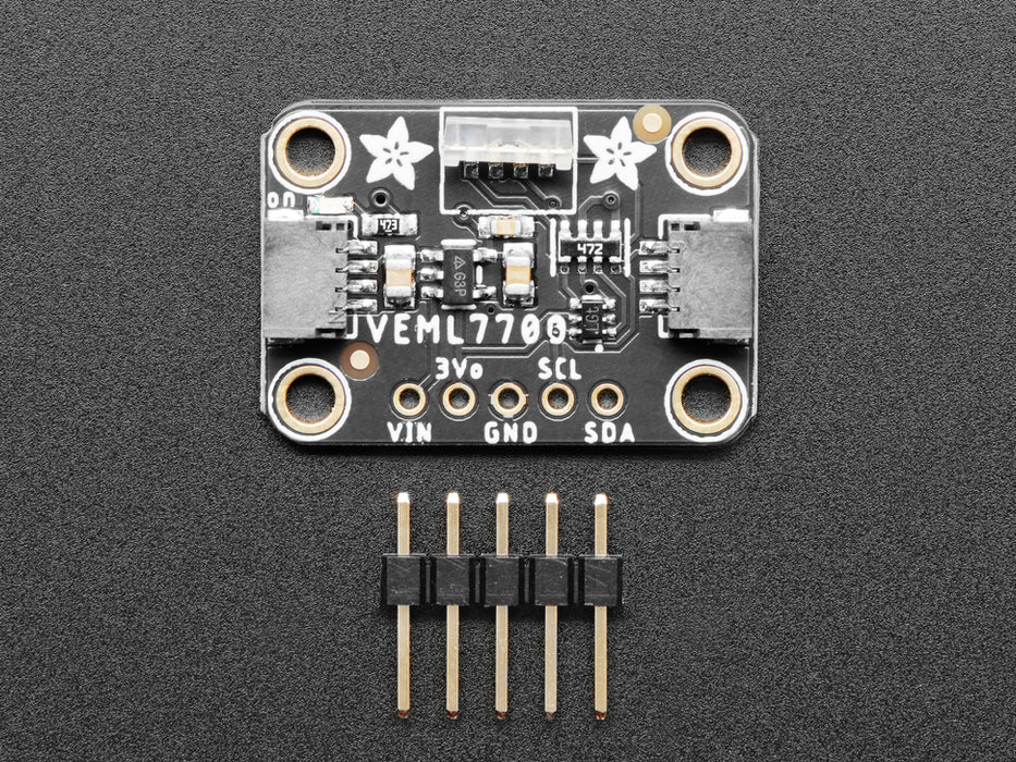 Angled shot of black rectangular breakout board with vertical light sensor.