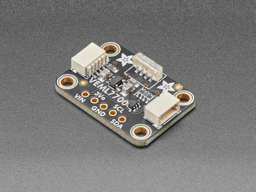 Angled shot of black rectangular breakout board with vertical light sensor.