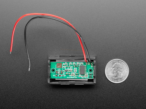 mini battery meter hooked up to a li-poly battery. The display on the battery meter reads three out of four blue tiers.