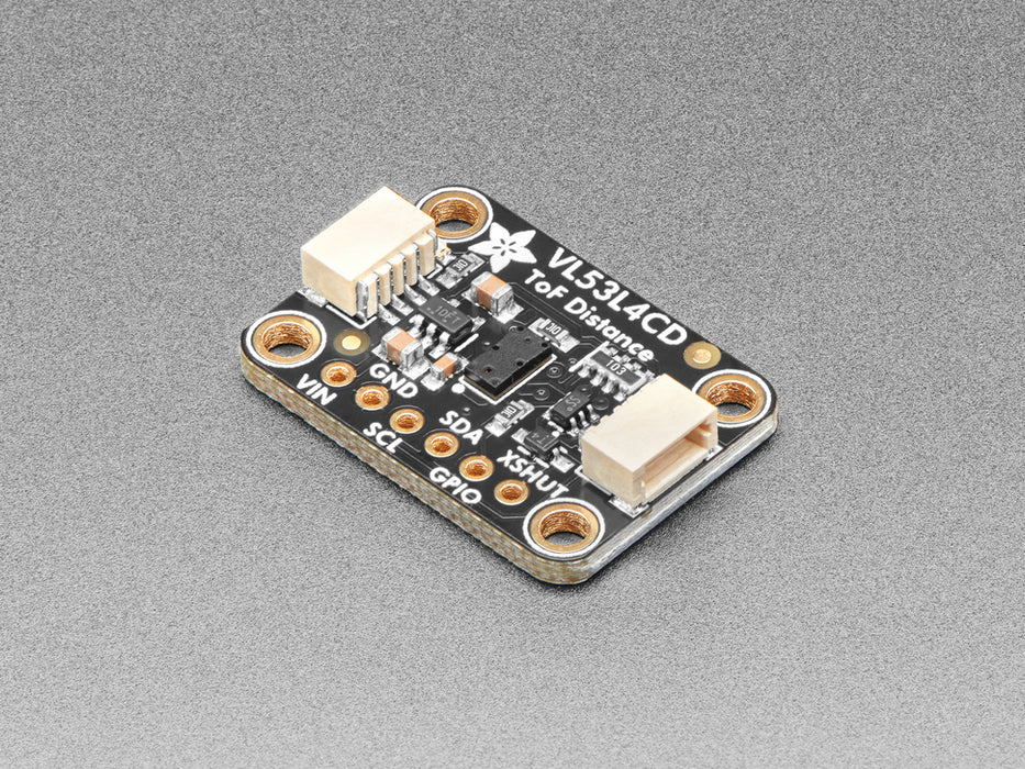 Video of a hand hovering over a Adafruit VL53L4CD Time of Flight Distance Sensor thats connected to a white breadboard reading the range of motion of the hand. 