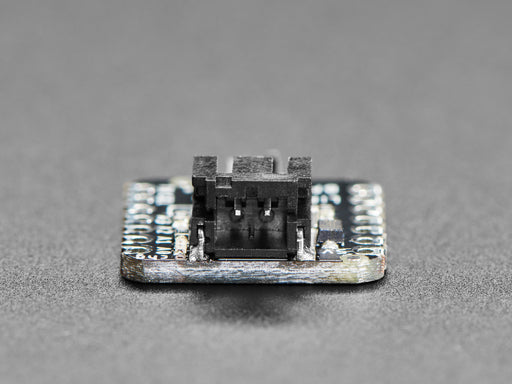 Video of a person with white painted nails unplugging a USB cable from a small, black, square-shaped lipo battery breakout board soldered to a similarly shaped microcontroller, which is also connected to a monochrome OLED display breakout. The OLED breakout displays battery and power data.