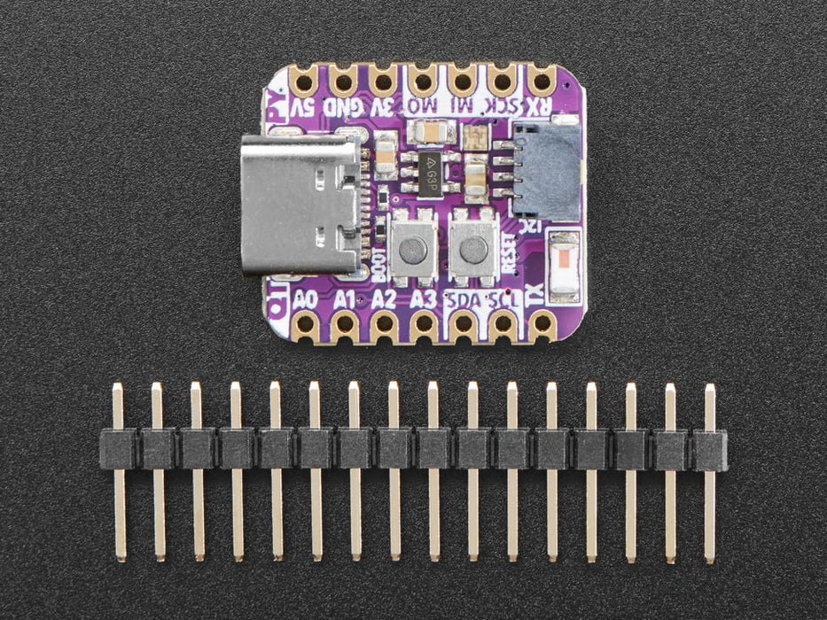 Angled shot of an Adafruit QT Py ESP32-C3 WiFi Dev Board with STEMMA QT.