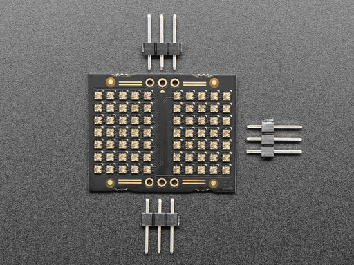 Video of an LED matrix board on a half-size breadboard counting up numbers in rainbow colors.