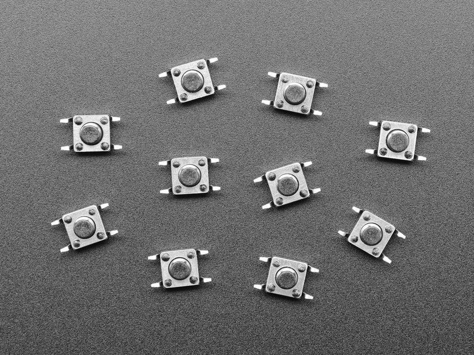 Angled shot of ten reverse tactile button switches.