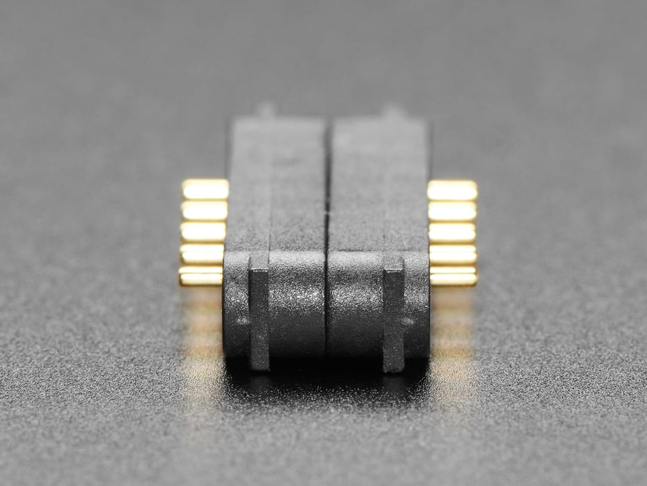 two separate pieces of 5-pin magnetic connectors