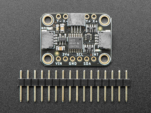 Video of a mushroom-manicured finger pressing a clear touchscreen display. The x-axis and y-axis dimensions are displayed on the connected monochrome OLED display breakout board.