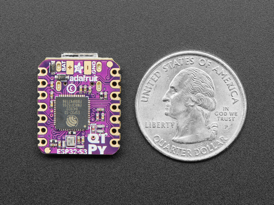 Angled shot of small purple microcontroller.