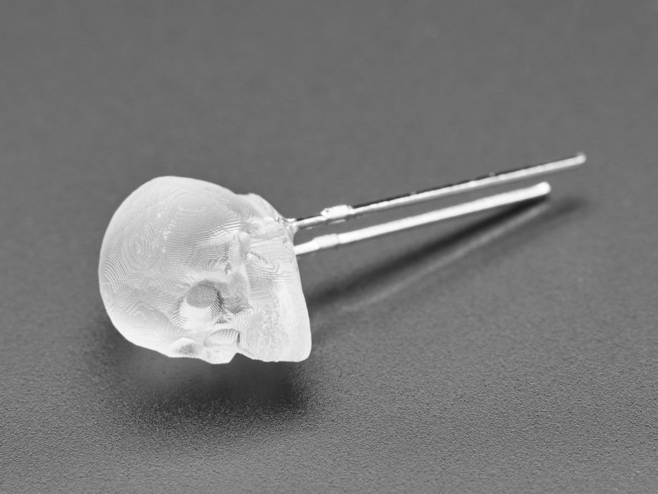 Video of a skull-shaped LED emitting cool white light.