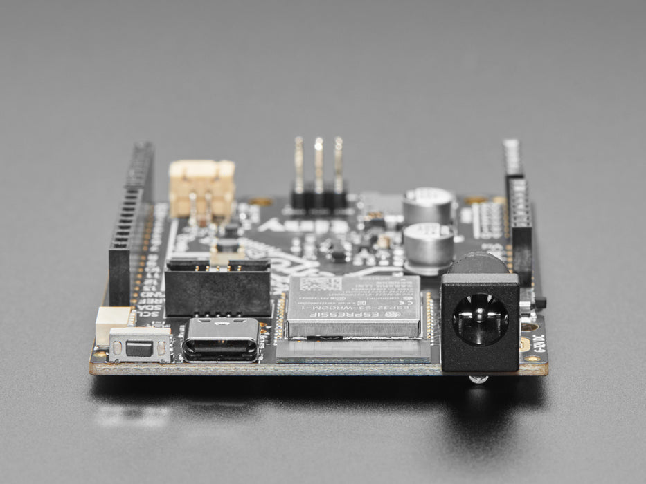 Angled shot of black, credit-card-sized dev board.