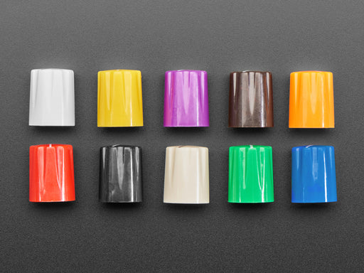 Angled shot of ten plastic micro potentiometer knobs in assorted colors.