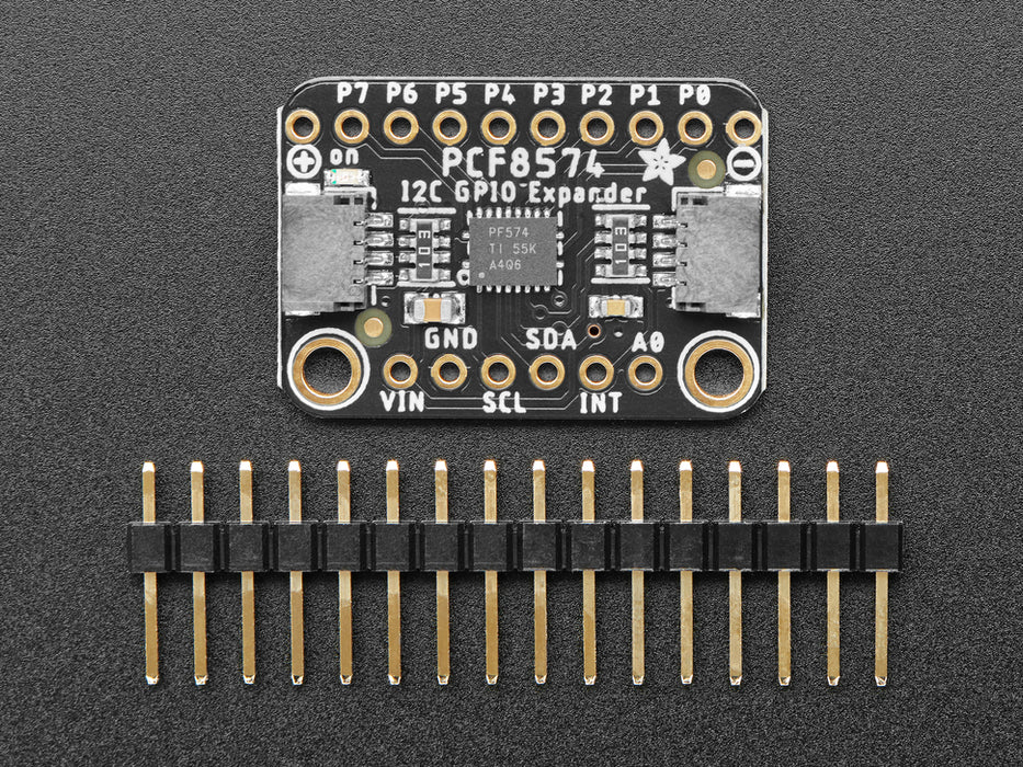 Adafruit PCF8574 I2C GPIO Expander Breakout connected to a QTPY displaying a hand clicking a button which lights up a red LED.