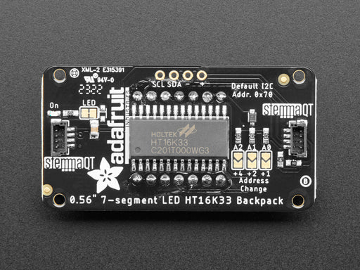 Video of green 7-segment clock display lit up.