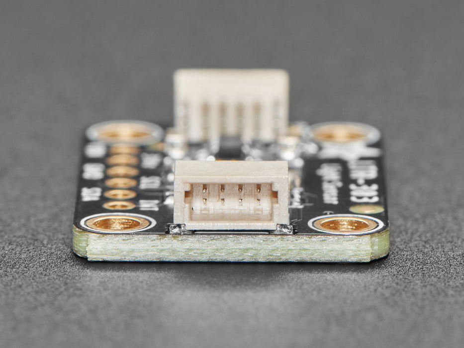 Overhead video of a light sensor connected to an OLED screen breakout, which displays infrared and visibility data.