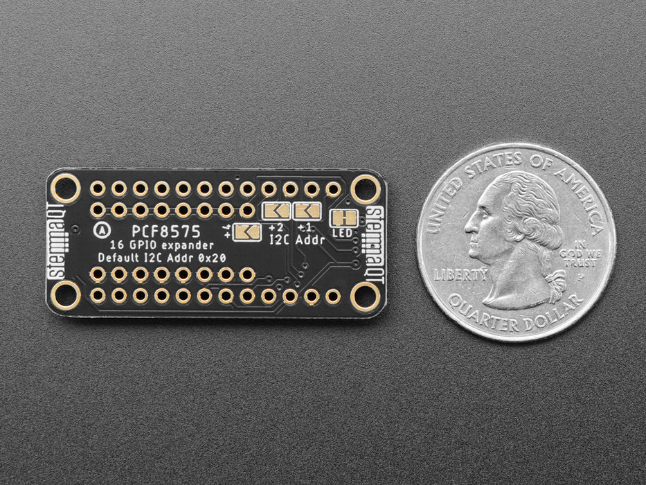 Overhead video of a GPIO expander breakout wired to two LEDs and a microcontroller on a breadboard. A hand presses a button on the bottom of the GPIO expander, individually lighting up the yellow and blue LEDs. 