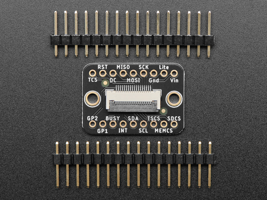 Overhead video of a 1.9" TFT display connected via 18-pin FPC ribbon cable to a square-shaped microcontroller on a breadboard. The TFT plays an animated boot-up demo.