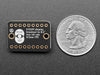 Overhead video of a 1.9" TFT display connected via 18-pin FPC ribbon cable to a square-shaped microcontroller on a breadboard. The TFT plays an animated boot-up demo.