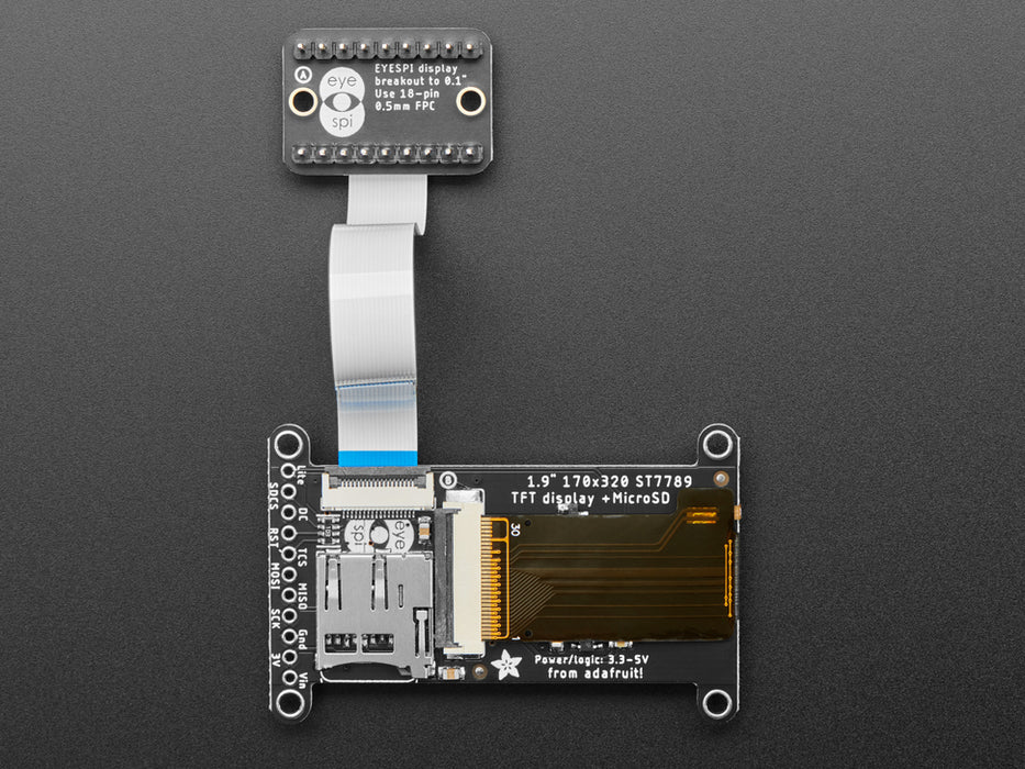 Overhead video of a 1.9" TFT display connected via 18-pin FPC ribbon cable to a square-shaped microcontroller on a breadboard. The TFT plays an animated boot-up demo.