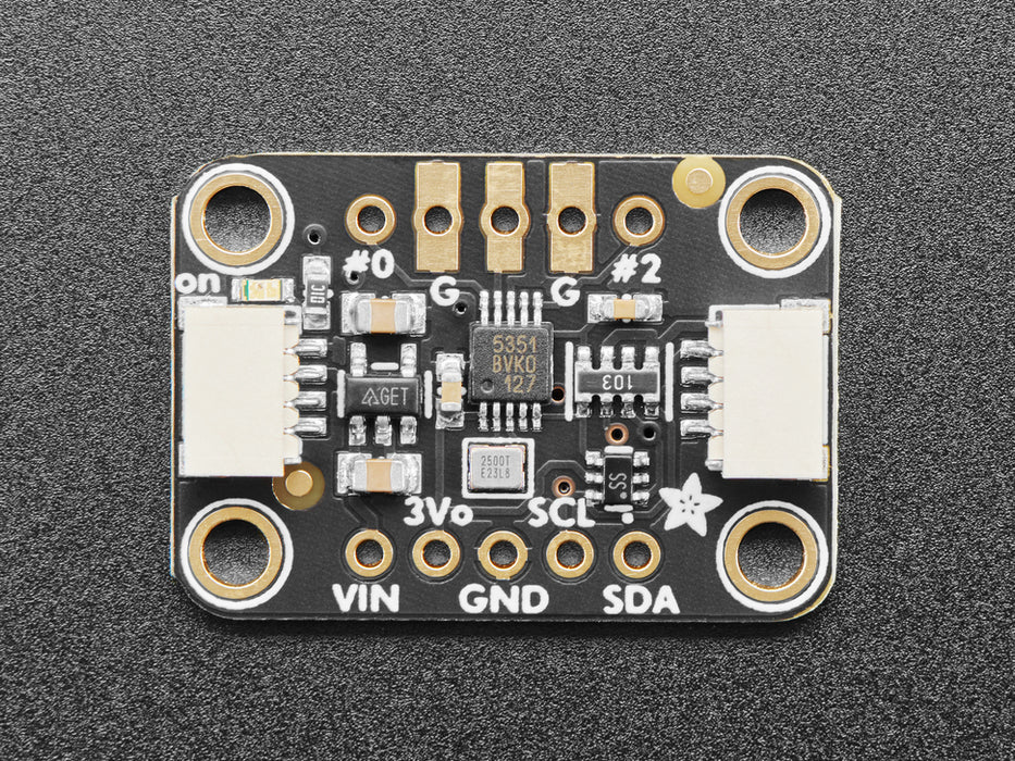 Angled shot of clock generator breakout board. 