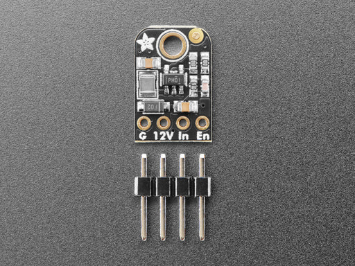 Angled shot of small, black, rectangular boost converter breakout board.